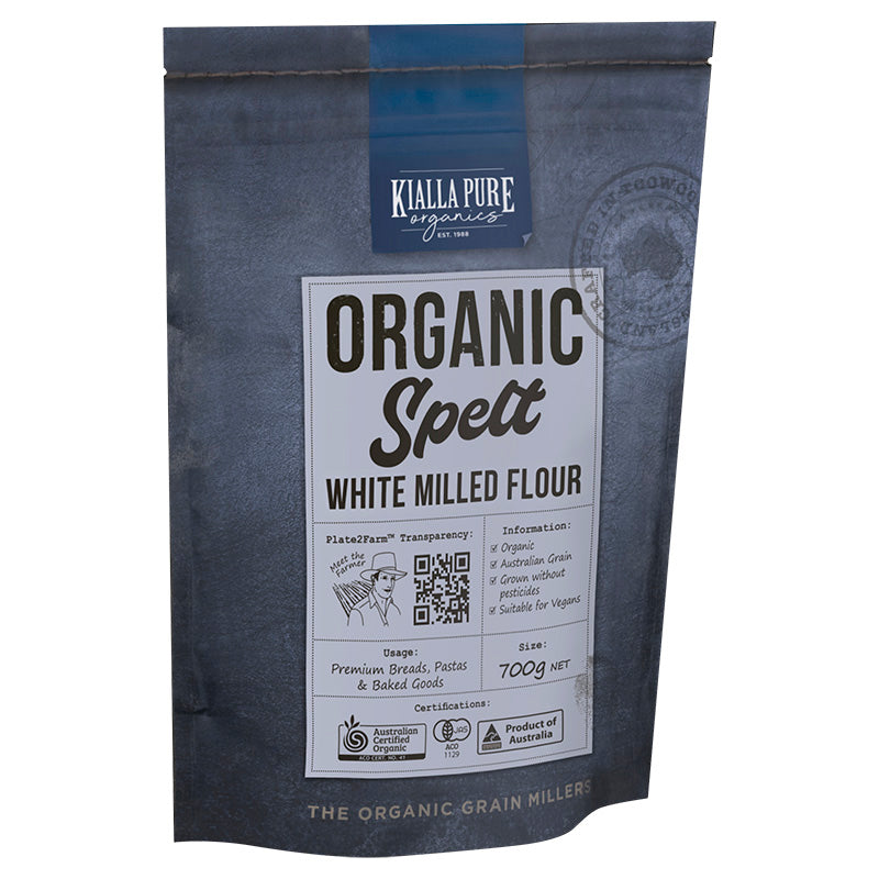 A package of Kialla Pure Foods Organic Spelt White Milled Flour, 700g size, with branding and product information displayed on the label.