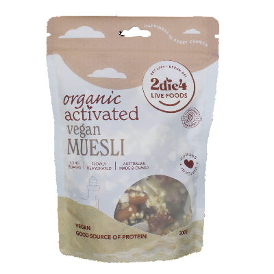 Packaging of organic activated vegan muesli by 2die4 live foods, showing the product and its ingredients like nuts and dried fruits, and highlighting its organic and vegan attributes.