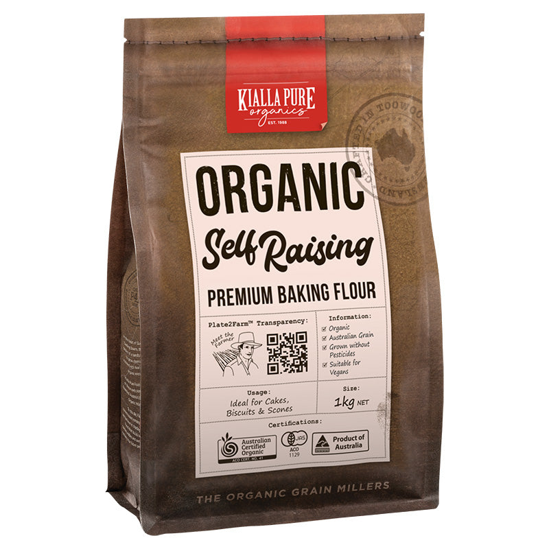 A package of Kialla Pure Foods Organic Self Raising Premium Baking Flour in a 1kg bag.