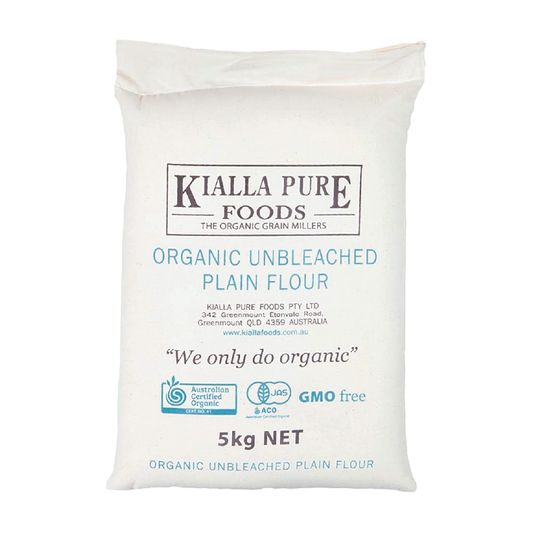 Bag of Kialla Pure Foods organic unbleached plain flour on a white background