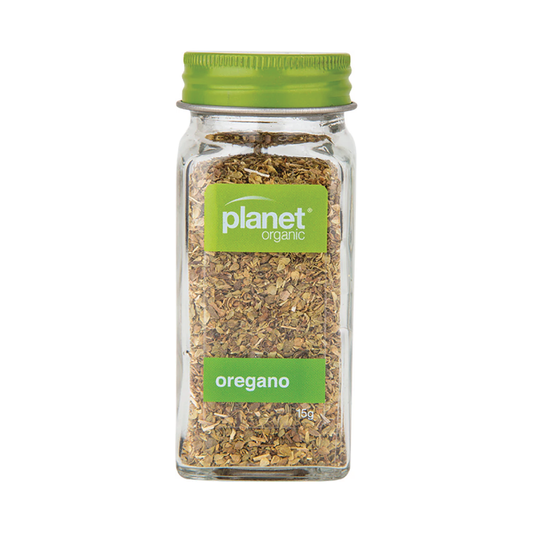 Jar of Planet Organic Oregano on a white background.