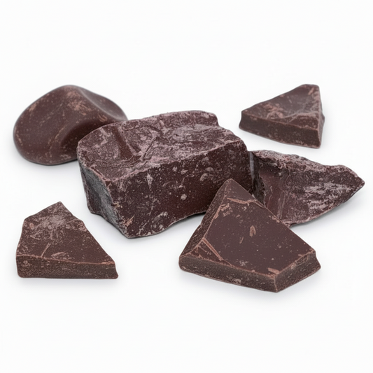 Dark chocolate chunks on a white background